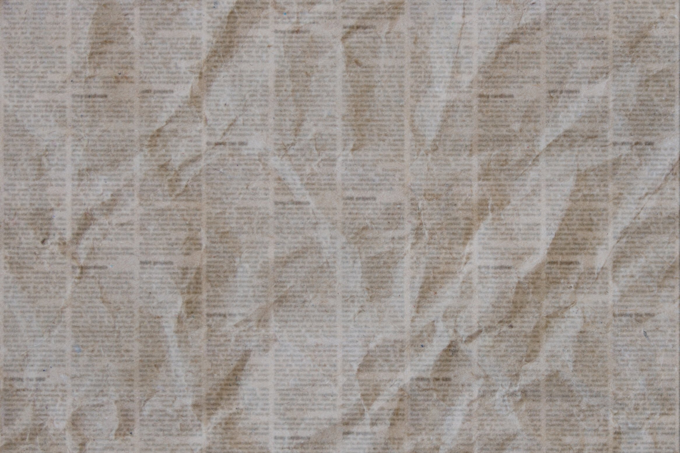 Old crumpled newspaper texture background